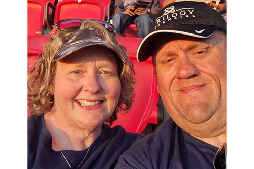 Angie Redecker and husband at baseball game